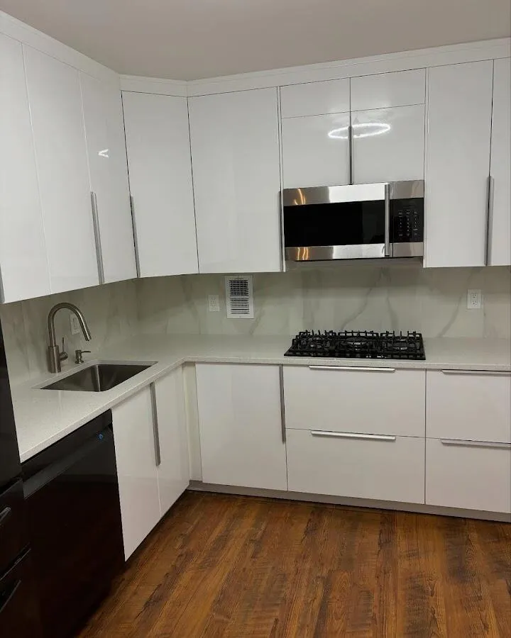 Restored kitchen with white cabinets after water damage in Hastings